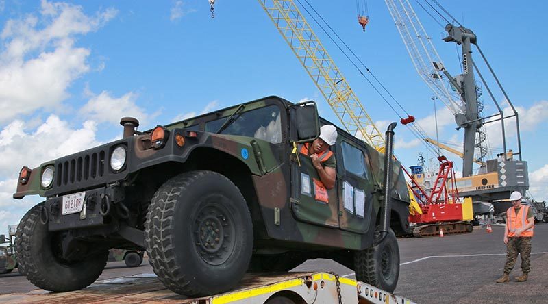 US Marines with Marine Rotation Force - Darwin load a Humvee at East Wharf Port Darwin. US Marine Corps photo by Lance Corporal Natalie Greenwood.