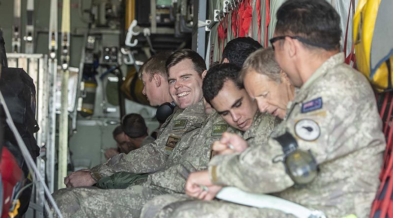 New Zealand Defence Force personnel onboard a Royal New Zealand Air Force C-130H Hercules on their way home after more than five months deployment in Iraq followed by two weeks in isolation to meet COVID-19 requirements. The Hercules dropped members off in Hamilton, Tauranga, Wellington, Christchurch and at RNZAF Base Ohakea in Manawatū before returning to RNZAF Base Auckland later today. NZDF photo.