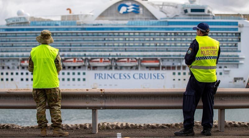 An Australian Army soldier and a New South Wales Police officer provide security at Port Kembla as part of the Australian government’s COVID-19 response. Photo by Corporal Chris Beerens.