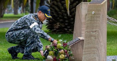 Executive Officer HMAS Albatross Commander Nigel Rowan lays a wreath to remember those lost in the 2005 Sea King helicopter crash at the Shark 02 memorial at HMAS Albatross. Photo by Chief Petty Officer Cameron Martin.