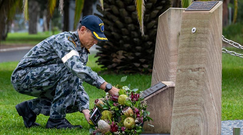 Executive Officer HMAS Albatross Commander Nigel Rowan lays a wreath to remember those lost in the 2005 Sea King helicopter crash at the Shark 02 memorial at HMAS Albatross. Photo by Chief Petty Officer Cameron Martin.