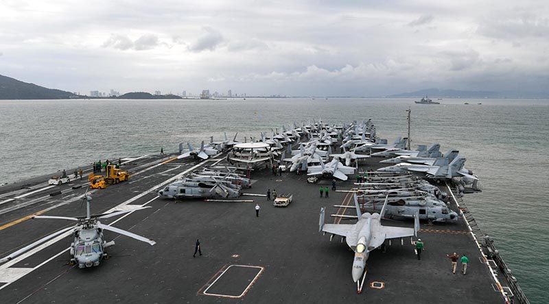 USS Theodore Roosevelt in Da Nang (5 March 2020) to commemorate the 25th anniversary of US/Vietnam diplomatic relations. Photo from USS Theodore Roosevelt Facebook page.