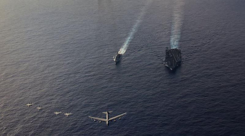 USS Theodore Roosevelt exercises with US Air Force out of Kadena Air Base, Japan, on 20 March 2020. Photo from USS Theodore Roosevelt Facebook page.