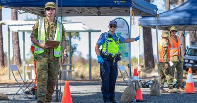 Private Connor Place-Diamond from 16th Battalion, Royal Western Australia Regiment, assists Western Australian Police Officer First Class Constable Linda Taurima to conduct a traffic stop on Indian Ocean Drive in Wilbinga as part of the Defence Assistance to the Civil Community support for COVID-19 Assist. Photo by Leading Seaman Ernesto Sanchez.