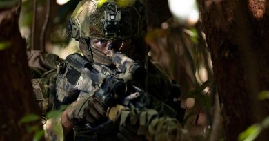 A sniper from the 2nd Battalion, Royal Australian Regiment, patrols through the Cowley Beach Training Area, north Queensland. Photo by Corporal Tristan Kennedy.