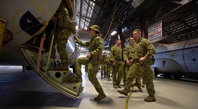 Personnel from 176 Air Dispatch Squadron board a C-130 Hercules training aid at RAAF Base Richmond. Photo by Corporal Oliver Carter.