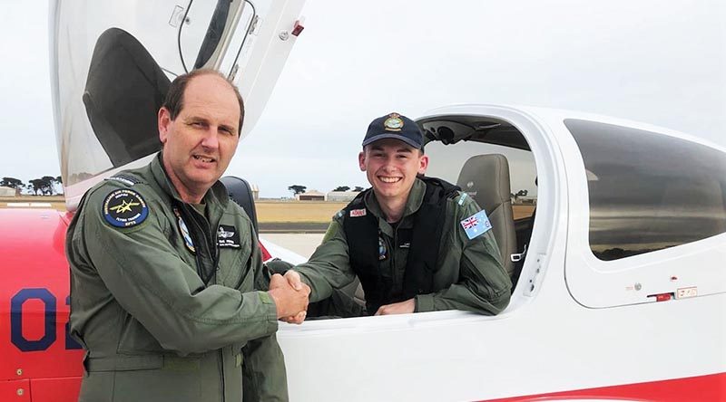 Lachlan Davis from 428 Squadron, a Cadet Sergeant at the time, is congratulated by his instructor WGCDR (AAFC) Stephen Pepper, Officer Commanding Aviation Operations Wing, following his first solo flight in the Diamond DA40 NG on 18 April 2019. Image supplied by the Elementary Flying Training School, Point Cook.
