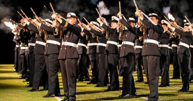 Royal Australian Navy New Entry Officers fire blank cartridges during a ceremonial sunset ceremony the evening before their graduation. Photo by Chief Petty Officer Cameron Martin.