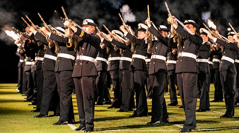 Royal Australian Navy New Entry Officers fire blank cartridges during a ceremonial sunset ceremony the evening before their graduation. Photo by Chief Petty Officer Cameron Martin.