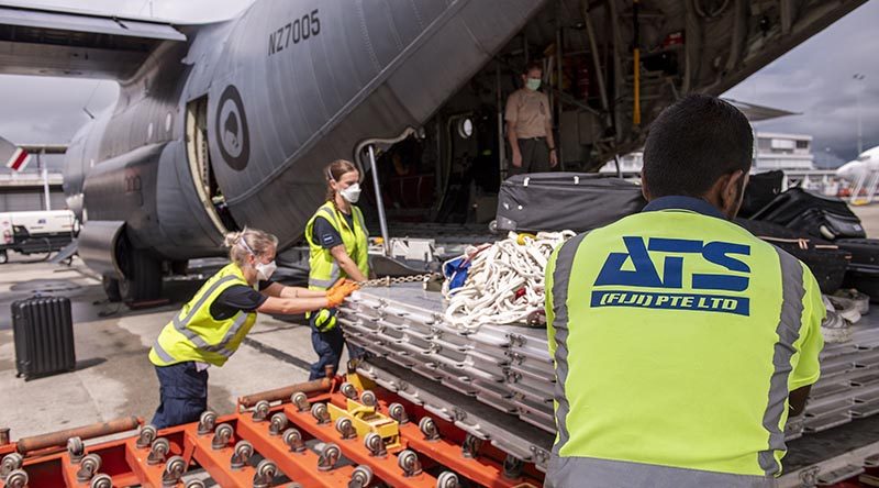 A Royal New Zealand Air Force C-130H Hercules delivering supplies including tarpaulins, tools, generators and personal hygiene kits to Fiji after Tropical Cyclone Harold. NZDF photo.