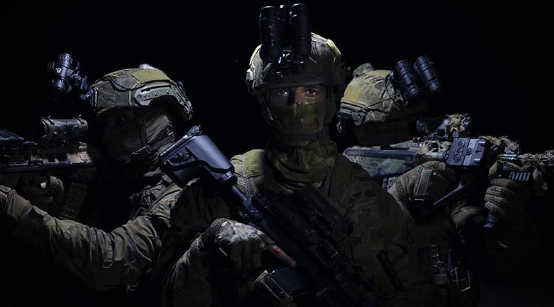 Private Kai Cooper (centre) from the 2nd Battalion, Royal Australian Regiment, during amphibious raid training at the Cowley Beach Training Area, north Queensland. Photo by Sergeant Jake Sims.