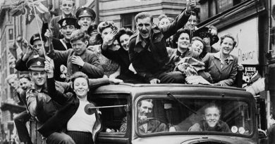 Ve Day Celebrations in London, 8 May 1945 A truck of revellers passing through the Strand, London. Imperial War Museum collection.