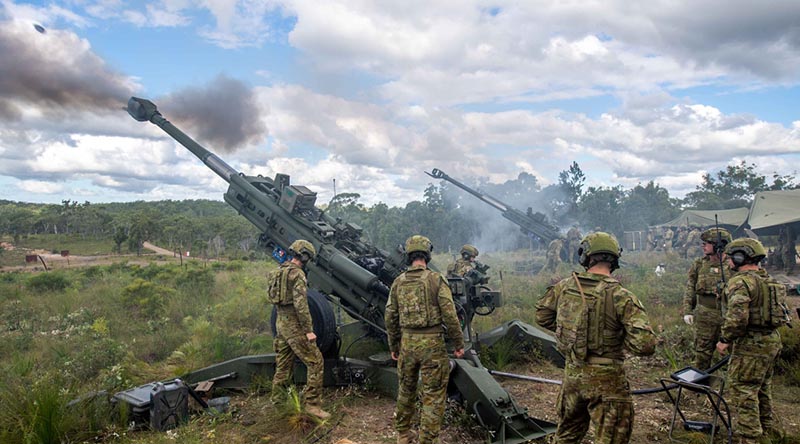 Australian Army soldiers from the 1st Regiment, Royal Australian Artillery, firing their M777A1 155mm Howitzers during Exercise Barce II at Wide Bay Training Area, Queensland. Photo by Trooper Jonathan Goedhart.
