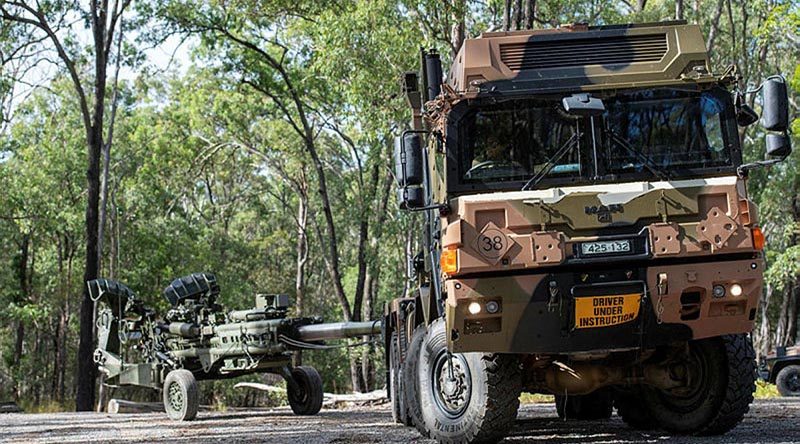 A MAN HX77 truck tows a M777A1 155mm Howitzer during a Gun Tow Drivers Course run by soldiers from the 1st Regiment, Royal Australian Artillery, at Gallipoli Barracks, Brisbane. Photo by Trooper Jonathan Goedhart.