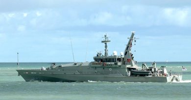 HMAS Armidale leaves Darwin Harbour. Photo by Able Seaman Helen Frank.