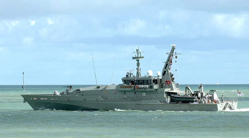 HMAS Armidale leaves Darwin Harbour. Photo by Able Seaman Helen Frank.