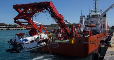 The submarine rescue vessel LR5 is recovered on to the work deck of MV Stoker from the basin at Fleet Base - West after a systems test run during Ex Black Carillon 2016. Photo by Leading Seaman Bradley Darvill.
