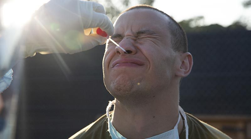 A US Marine with Marine Rotational Force - Darwin is swabbed during a COVID-19 test at RAAF Base Darwin. US Marine Corps photo by Lance Corporal Natalie Greenwood.