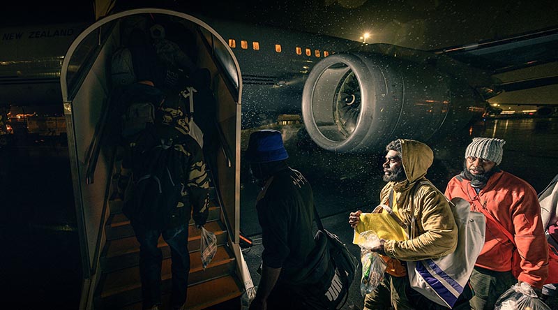 Seasonal workers from Vanuatu board a Royal New Zealand Air Force Boeing 757 at Christchurch. NZDF photo.