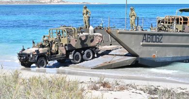 The first RSFG vehicle comes ashore at Norwegian Bay. Australian Border Force photo.