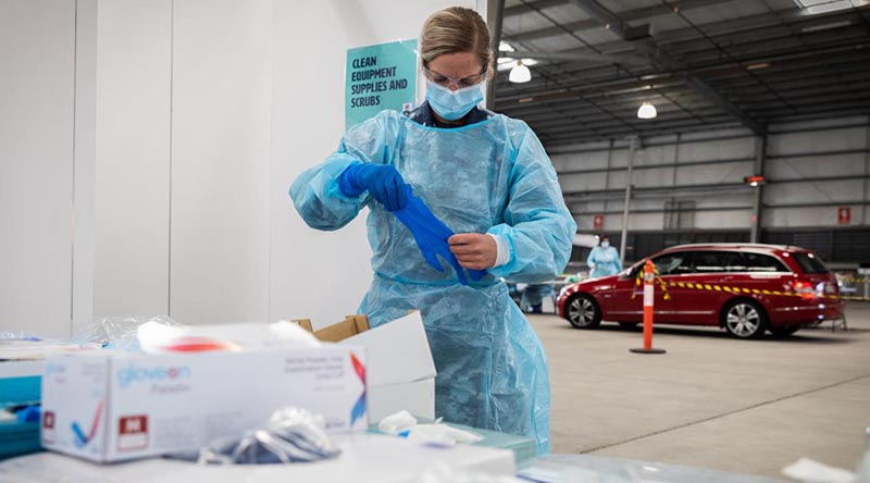 Leading Aircraftwoman Hayley Daniel, No.1 Expeditionary Health Squadron, prepares for COVID-19 testing at the Melbourne Showgrounds during Operation COVID-19 Assist. Photo by Leading Aircraftman John Solomon.