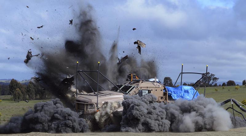 A Hawkei is subjected to a live-fire underbelly blast testing during trials in 2011.