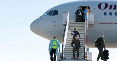 US Marines of Marine Rotational Force - Darwin arrive at RAAF Base Darwin, NT, greeted by health-screening officials. Photo by Petty Officer Peter Thompson.