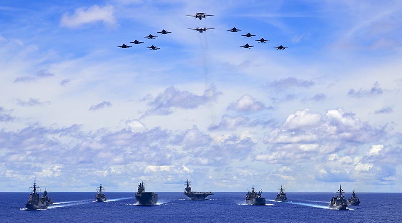 HMA Ships Canberra, Hobart, Stuart, Arunta and Sirius taking part in a trilateral passage in the Philippine Sea with US Navy ships Ronald Reagan, Antietam and Mustin and the Japanese Maritime Self-Defense Force’s JS Teruzuki.