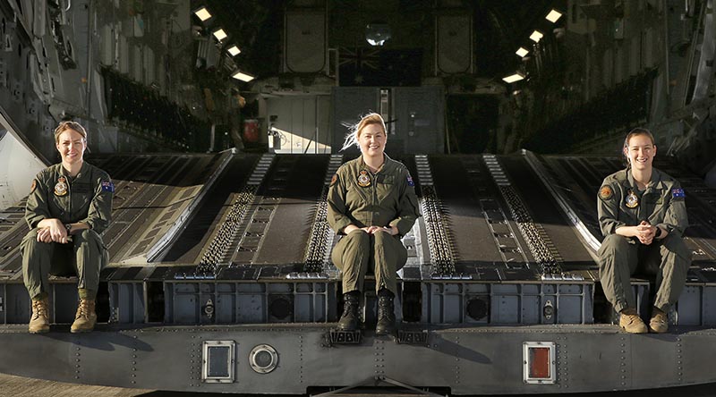 C-17A Globemaster III captain Flight Lieutenant Caitlin Rytenskild (centre), heads an all-female aircrew alongside co-pilot Flying Officer Gemma Dorn (left) and Loadmaster Corporal Charlotte Roe. Photo by Corporal Colin Dadd.