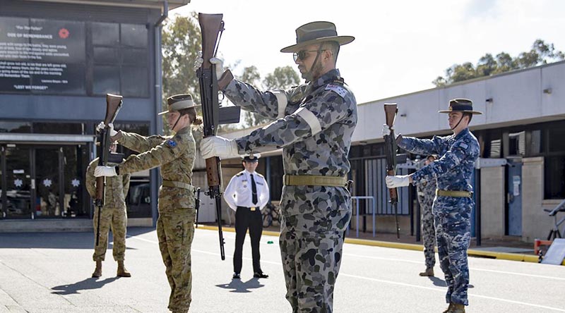 Members of Australia's Federation Guard practise drill for the upcoming Victory in the Pacific Day ceremony. Photo by Corporal Julia Whitwell.