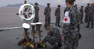 Commanding Officer HMAS Canberra Captain Terry Morrison lays a wreath to commemorate the sinking of HMAS Canberra I off Savo Island, Solomon Islands. Photo by Leading Seaman Ryan Tascas.