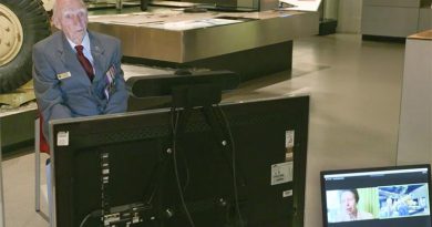 WWII veteran Les Cook chats with Princess Anne via Zoom in the WWII Gallery of the Australian War Memorial. 