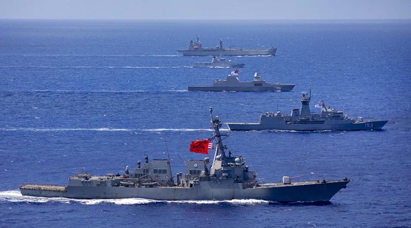 HMA Ships Sirius (top) and Stuart (second from bottom) sail in company with RSS Supreme, KDB Daruleshan and USS Rafael Peralta through the Pacific Ocean. Photo by Leading Seaman Christopher Szumlanski.