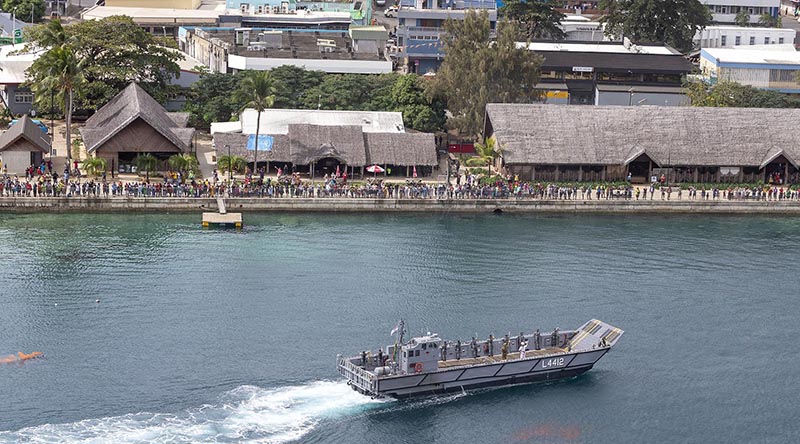 A landing craft from HMAS Choules prepares to join the Vanuatu Police Maritime Wing in a Seafarer’s Parade to celebrate Vanuatu Independence Day. Photo by Leading Seaman James McDougall.