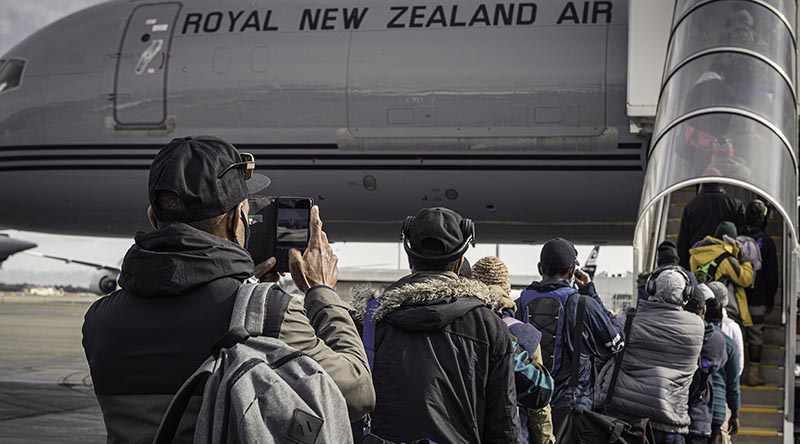 Seasonal workers board a Royal New Zealand Air Force Boeing 757 at the RNZAF air movements terminal at Christchurch International Airport, bound for Port Vila in Vanuatu. NZDF photo.