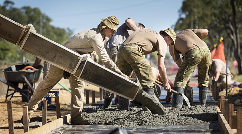 Australian Army engineers pour concrete. Photo by Sergeant Janine Fabre.