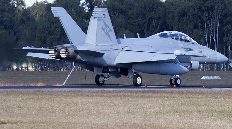 A RAAF E/A-18G Growler from No 6 Squadron takes the arrestor cable at RAAF Base Amberley during Exercise alisman Saber 17. Photo by Sergeant Peter Borys.