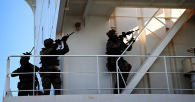 Special Air Service Regiment soldiers prepare to secure a ship's bridge during martime counter-terrorism training. Photo by Corporal Christopher Dickson.