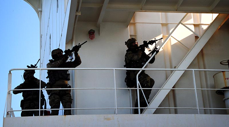 Special Air Service Regiment soldiers prepare to secure a ship's bridge during martime counter-terrorism training. Photo by Corporal Christopher Dickson.