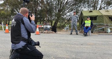 Australian War Memorial commissioned photographer Gary Ramage photographs Lieutenant Jay Sumner with NSW Police Force Acting Sergeant David Adams. Photographer un-named, ironically.