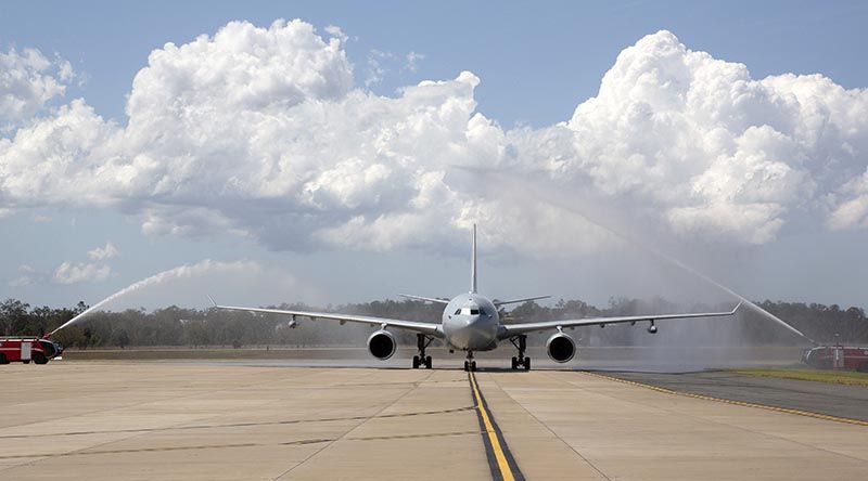 KC-30A Multi Role Tanker Transport A39-006 transporting No. 33 Squadron personnel returning home from the Middle East, is given a guard of honour by No. 23 Squadron Fire Section on arrival at RAAF Base Amberley. Photo by Corporal Colin Dadd.