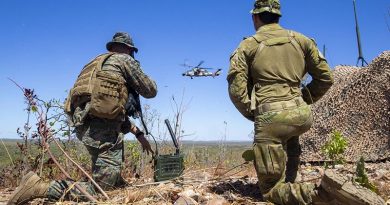 US Marine Corps Captain Benjamin Hovies and Australian Army Sergeant Aaron Costas manage airspace at Mount Bundey Training Area, during a US Air Force bombing mission. US Marine Corps photo by Corporal Harrison Rakhshani.