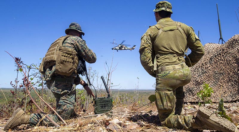 US Marine Corps Captain Benjamin Hovies and Australian Army Sergeant Aaron Costas manage airspace at Mount Bundey Training Area, during a US Air Force bombing mission. US Marine Corps photo by Corporal Harrison Rakhshani.