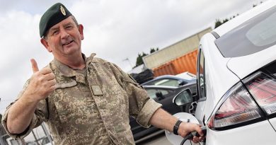 Trentham Camp Commander Major Jim Maguire plugs into the new charging station on camp. NZDF photo.