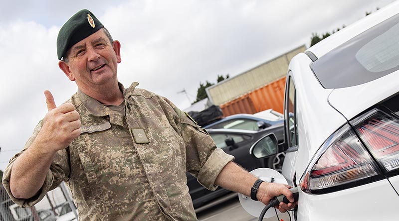 Trentham Camp Commander Major Jim Maguire plugs into the new charging station on camp. NZDF photo.