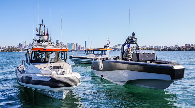 A Whiskey Alpha 85 (right) and two Marine NSW boats designed by Naiads and built by YWE. Photo © Salty Dingo 2020.