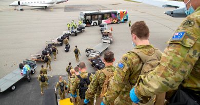 Soldiers from the 1st Battalion, Royal Australian Regiment, arrive at Perth Airport, Western Australia, to support quarantine compliance monitoring. Photo by Petty Officer Yuri Ramsey.