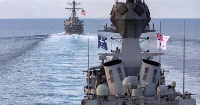 HMAS Ballarat sails with USS John S. McCain in the Strait of Malacca. Photo by Leading Seaman Shane Cameron.