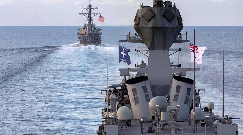 HMAS Ballarat sails with USS John S. McCain in the Strait of Malacca. Photo by Leading Seaman Shane Cameron.