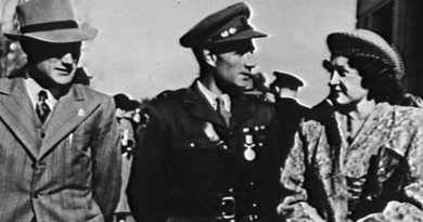 Captain Bede Tongs (centre) with his wife and his brother Reginald after being presented his Military Medal by the Governor-General in Canberra, July 1947. Australian War Memorial photo 134820.